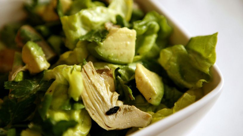 This winter salad contains boston lettuce with avocado and artichokes. (Kirsten Luce/Newsday/MCT)
