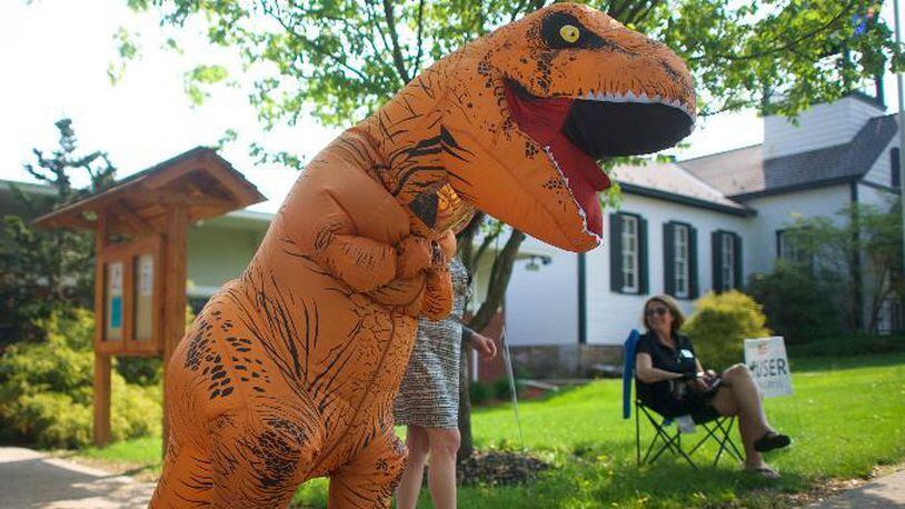 Stock photo of an inflatable T-Rex costume.