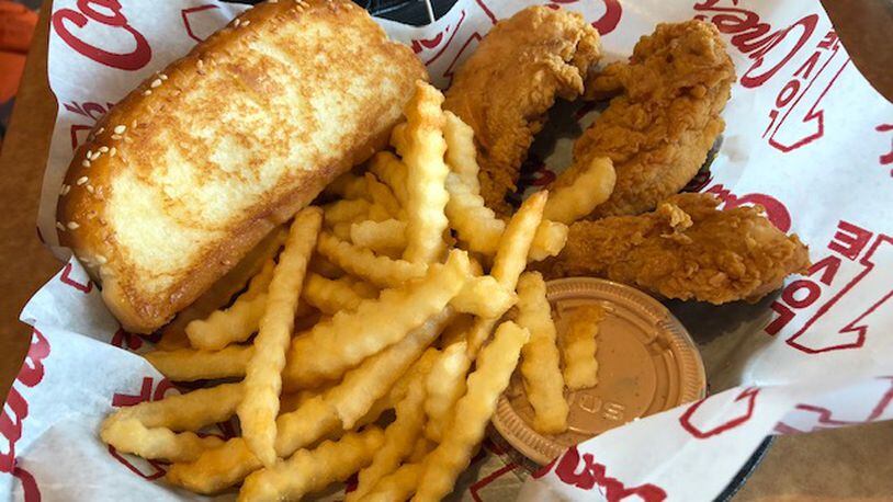 Raising Cane’s Chicken Fingers, the Louisiana-based restaurant company, opened its first location in Beavercreek at 4384 Indian Ripple Road on Tuesday, Oct. 30 2018. MARK FISHER / STAFF PHOTO