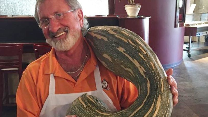 Franco Germano holding a squash — a very large squash — in the restaurant he founded in 1976 at the age of 31: Franco’s Ristorante Italiano, at 824 E. Fifth St. in Dayton. SUBMITTED