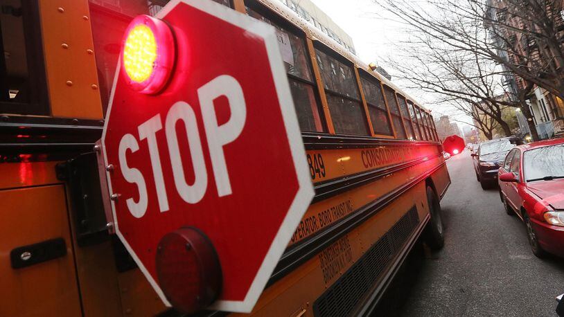 A Maryland girl is in critical condition after being hit by a pickup truck as she exited a school bus.