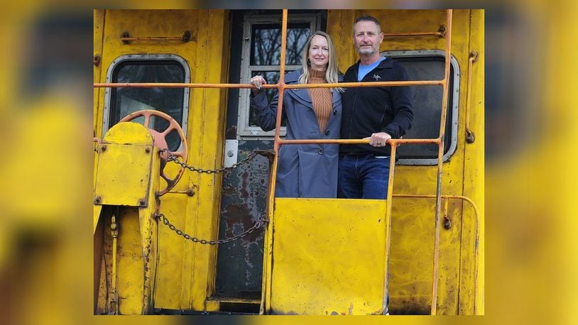 Entrepreneur couple Ray and Karen DeVite are turning old train cars into Airbnb's on the east side of Xenia. MARSHALL GORBY\STAFF