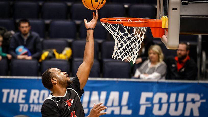 Josh Earley a forward for Southeast Missouri, tips in a basket during practice Monday, March 13, 2023, at the First Four at UD Arena in Dayton. JIM NOELKER/STAFF