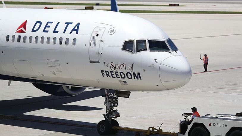 A Delta airlines plane on the tarmac at Fort Lauderdale-Hollywood International Airport. Georgia lawmakers passed a state tax cut measure Thursday that left out a sales tax cut on jet fuel in a swipe at Delta Airlines after the carrier eliminted a discount for NRA members following the deadly school shooting in Parkland, Fla.