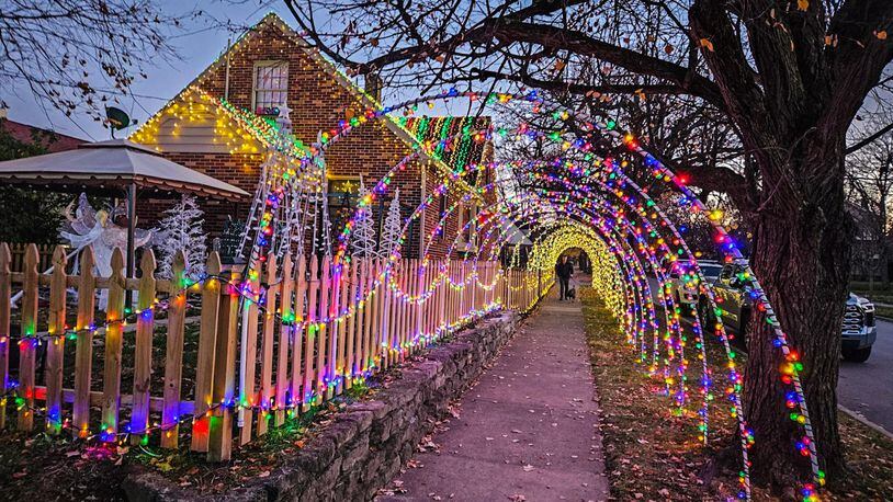 An Oakwood resident with an elaborate outdoor holiday lights display is asking the city to approve a process for a seasonal permit allowing such exhibits in the public right of way. CONTRIBUTED