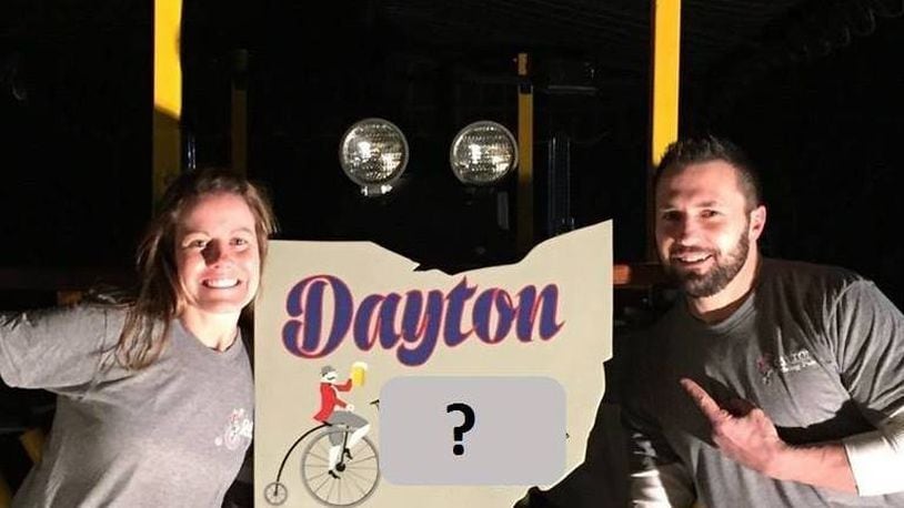 Chad Banter and his partner and girlfriend Lindsay Kleinhenz are changing the name of their beer bike after receiving a letter  from an attorney for Minneapolis-based Pedal Pub. The couple expects to announce a name for the company formerly known as Dayton Pedaling Pub. Photo: Chad Banter and Lindsay Kleinhenz