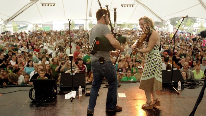 The band Gaelic Storm performs to a large crowd on the Guinness stage at the United Irish of Dayton Celtic Festival at RiverScape MetroPark Saturday July 31. Staff Photo by Jim Witmer