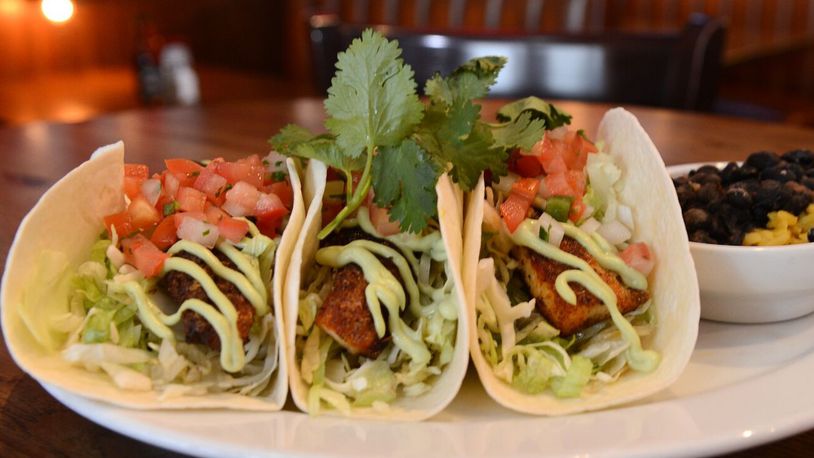 Columbus-based Rusty Bucket Restaurant & Tavern, which operates a restaurant in front of the Dayton Mall in Miami Twp.,  has hit the “refresh” button on some of its most popular menu items , including Baja Tacos, and has also launched online reservations.