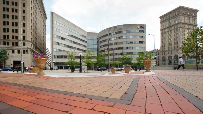 The Dayton Area Chamber of Commerce will move to the former PNC Building (center) at Third and Main streets. CHRIS STEWART / STAFF