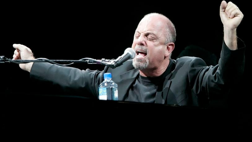 Billy Joel performs during a concert in this Monday, Jan. 23, 2006 file photo at Madison Square Garden in New York.  (AP Photo/Stephen Chernin, File)