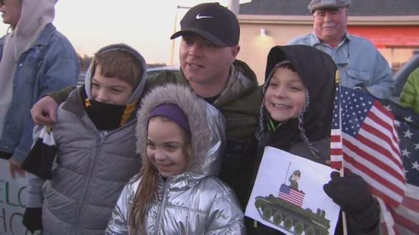 Dozens of people in Winthrop, Massachusetts, lined the streets to surprise a soldier returning home from serving in Afghanistan.