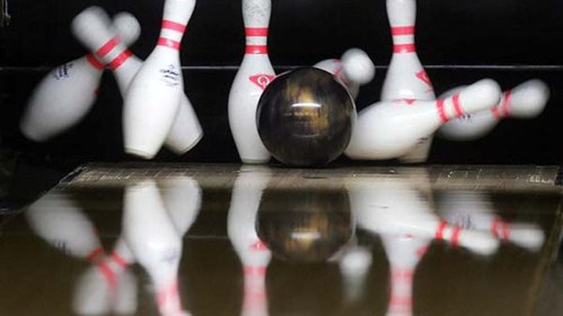 A ball scatters the pins during the final round of the 2008 PBA Central Region Dayton Open, Sunday, June 22, at Poelking Lanes South in Centerville.