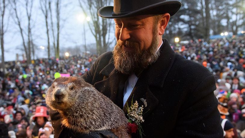 Handler AJ Dereume holds Punxsutawney Phil after he did not see his shadow predicting an early spring during the 133rd annual Groundhog Day festivities on February 2, 2019 in Punxsutawney, Pennsylvania.