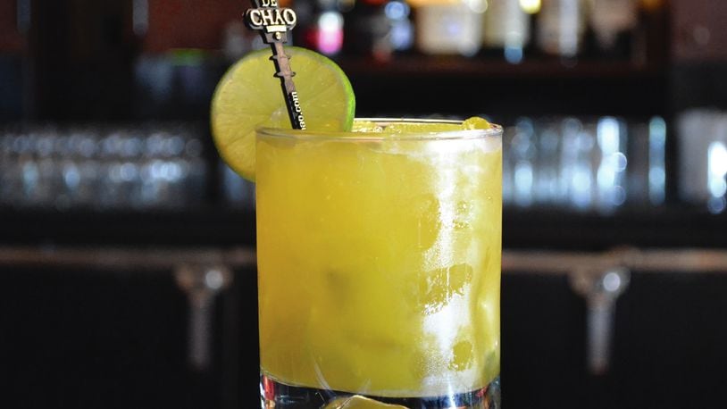The sweet and fruity Passionfruit Caipirinha is a perfect buffer to the summer heat.