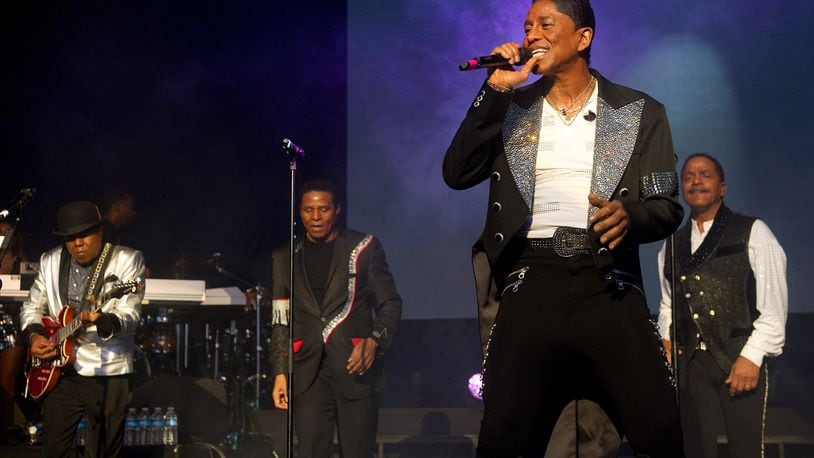 Jermaine Jackson turned 63 on Dec. 11, 2017. Here, he is shown with Tito Jackson, Jackie Jackson, and Marlon Jackson perform at The Henley Festival on July 12, 2014 in Henley-on-Thames, England. (Photo by Zak Hussein/Getty Images)