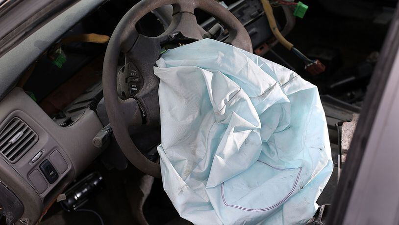 A deployed airbag is seen in a 2001 Honda Accord at the LKQ Pick Your Part salvage yard on May 22, 2015 in Medley, Florida. The largest automotive recall in history centers around the defective Takata Corp. air bags that are found in millions of vehicles that are manufactured by BMW, Chrysler, Daimler Trucks, Ford, General Motors, Honda, Mazda, Mitsubishi, Nissan, Subaru and Toyota.  (Photo by Joe Raedle/Getty Images)
