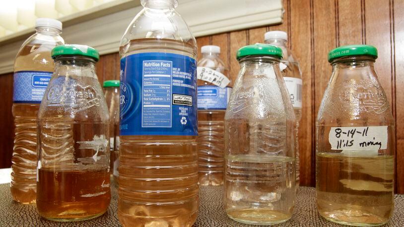 Samples of discolored tap water from a 2011 Clark County story. BARBARA J. PERENIC / STAFF FILE