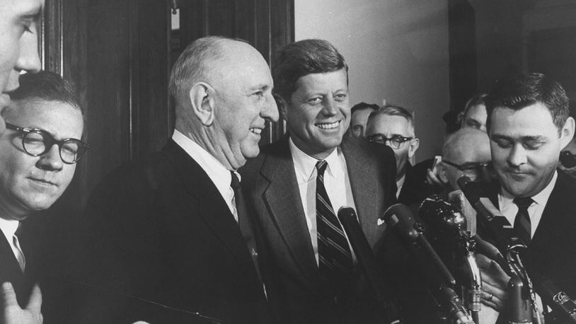 Pres. John F. Kennedy (center right) talks with Sen. Richard B. Russell (center left). A Senate office  building was named for Russell, a Democratic Senator from Georgia, after he died in 1971.  That building, the Russell Senate Office Building, may be renamed in honor of Sen. John McCain. McCain died Saturday, Aug. 25, 2018.