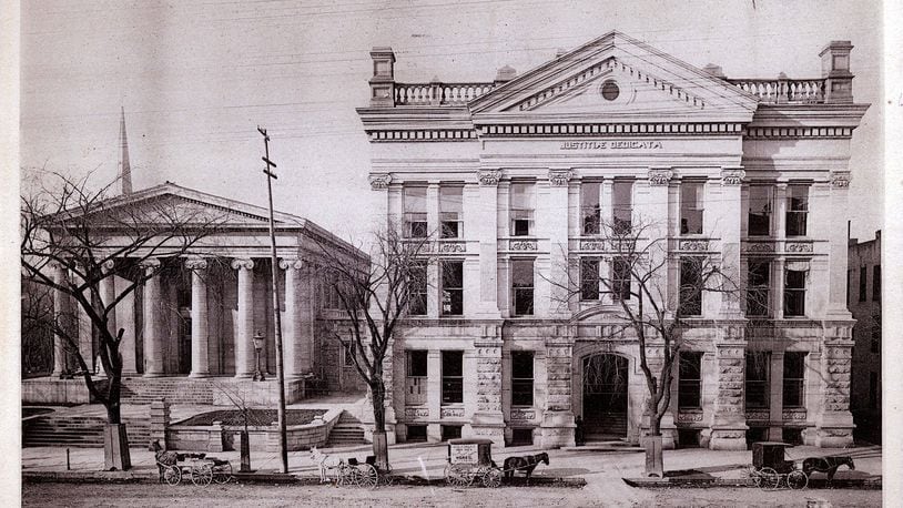 Dayton's old court house (left) opened in 1850 and the new court house opened in 1884. DAYTON METRO LIBRARY / LUTZENBERGER PICTURE COLLECTION