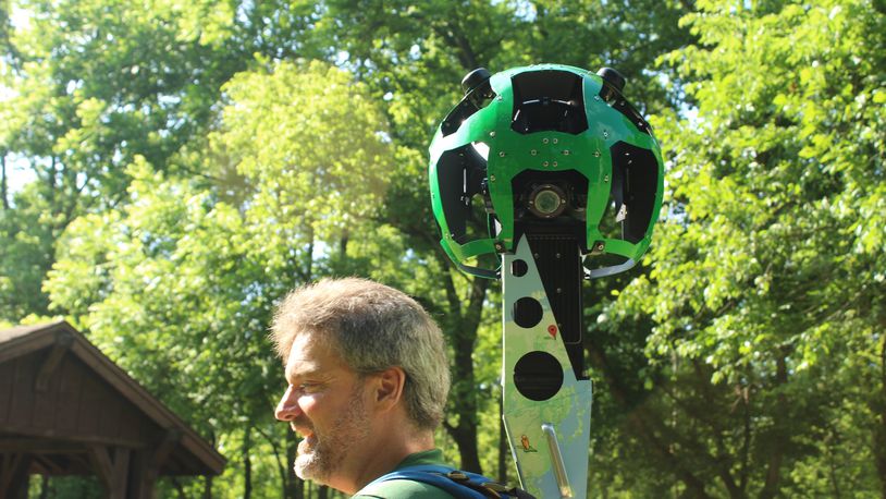 Five Rivers MetroPark is the first park system in Ohio to have its trails mapped for Google Maps. The effort is a partnership between Outdoor Adventure Connection and the 3,000-member Dayton Hikers group.  Outdoor Adventure Connection’s Andy Niekamp is pictured with Google's Street View Trekker  device. (Photo by Amelia Robinson)