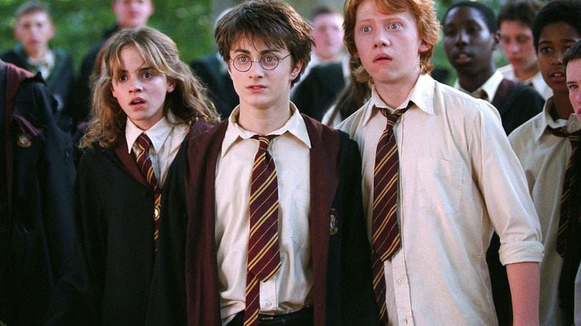 In this image released by Warner Bros., from left, Emma Watson as Hermione Granger, Daniel Radcliffe as Harry Potter and  Rupert Grint as Ron Weasley are shown in a scene from "Harry Potter and the Prisoner of Azkaban."  (AP Photo/Warner Bros., Murray Close)