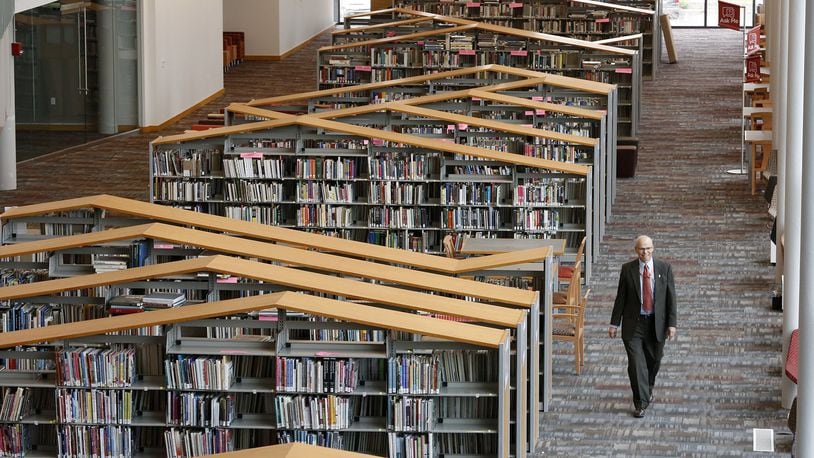 There is nearly three miles of fixed shelving in the new Dayton Metro Libary downtown, holding more than 335,000 volumes. LISA POWELL / STAFF