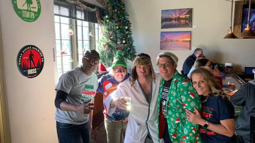 Alexis Larsen enjoying last year's Griswold Christmas Eve Brunch at Mudlick Tap House with friends and family and, of course, Cousin Eddie.