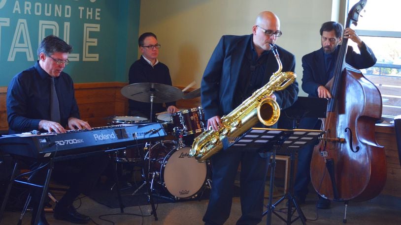 The Bright Moments Quintet, (left to right) Brian Cashwell, Jim Leslie, Bill Burns and Chris Berg, perform with vocalist Pamela Mallory in a Bob Ross Auto Group Jazz & Beyond Series concert at Dayton Art Institute on Thursday, April 14.