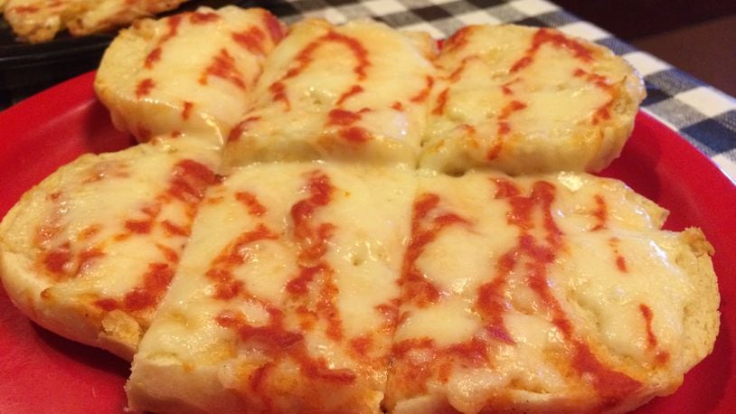 El Greco's cheese bread is loaded with provolone.