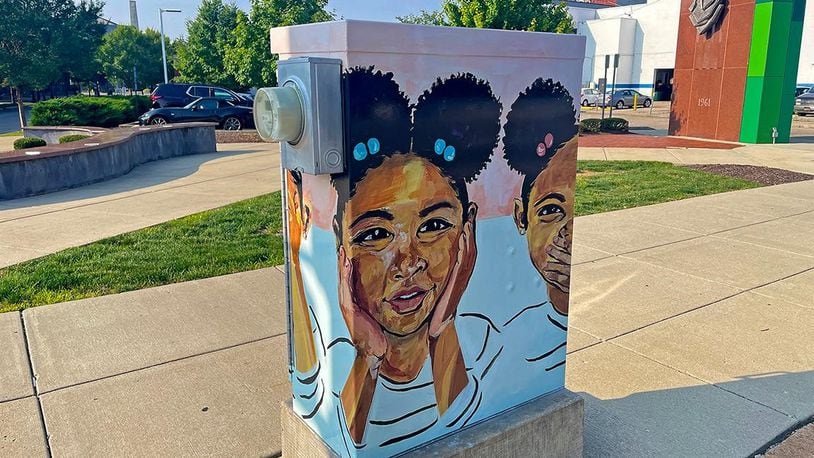 "Wise Ones" by Zuri Ali Cole is among the latest round of ArtWraps in downtown Dayton. CONTRIBUTED