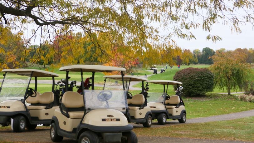 Golf carts are seen in a 2016 file photo. GREG LYNCH / STAFF