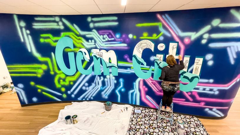 Dayton artist Tiffany Clark, founder of the Mural Machine, was commissioned to create a mural for AES Ohio's new Smart Operations Center.