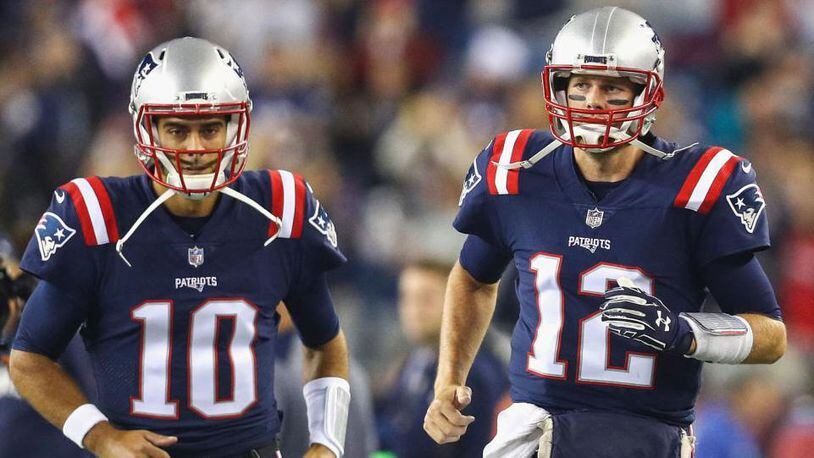 Thanks to a comeback win engineered Sunday by Tom Brady (12), Jimmy Garoppolo (10) earned a postseason bonus -- even though he no longer plays for the Patriots.