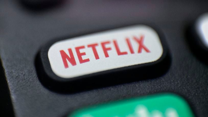 FILE - The Netflix logo is pictured on a remote control in Portland, Ore., Aug. 13, 2020. Netflix said Wednesday, Dec. 21, 2022, that it plans to build a state-of-the-art production facility at a former Army base at the Jersey Shore that will cost more than $900 million, and create thousands of jobs. (AP Photo/Jenny Kane, File)