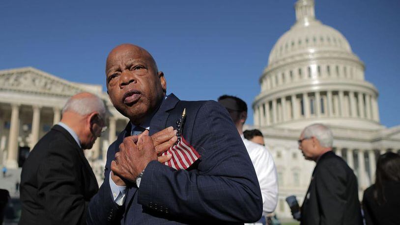 Rep. John Lewis (D-GA) thanks anti-gun violence supporters following a rally with fellow Democrats on the East Front steps of the U.S. House of Representatives October 4, 2017 in Washington, DC. The Democratic members of Congress held the rally to honor the victims of the mass shooting in Las Vegas and to demand passage of the bipartisan King-Thompson legislation to strengthen background checks and establishing a bipartisan Select Committee on Gun Violence.  (Photo by Chip Somodevilla/Getty Images)