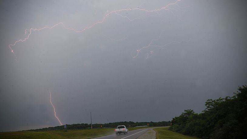 Storms move through the Miami Valley producing strong winds and lightning Friday, June 18, 2021. MARSHALL GORBY\STAFF