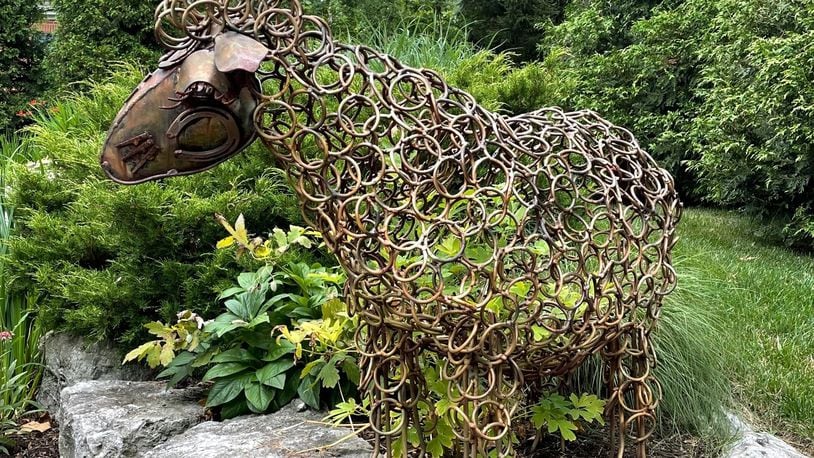 The Garden Club of Dayton is hosting a tour of six Oakwood and Kettering homes on Saturday, June 11. Beyond plants, some of the gardens include sculptures and water features. NANCY DANKOF/COURTESY PHOTO