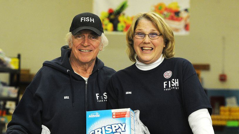 Bill Doorley, Pantry Manager, and his wife Jane, Executive Director of Fairborn Fish. MARSHALL GORBY\STAFF