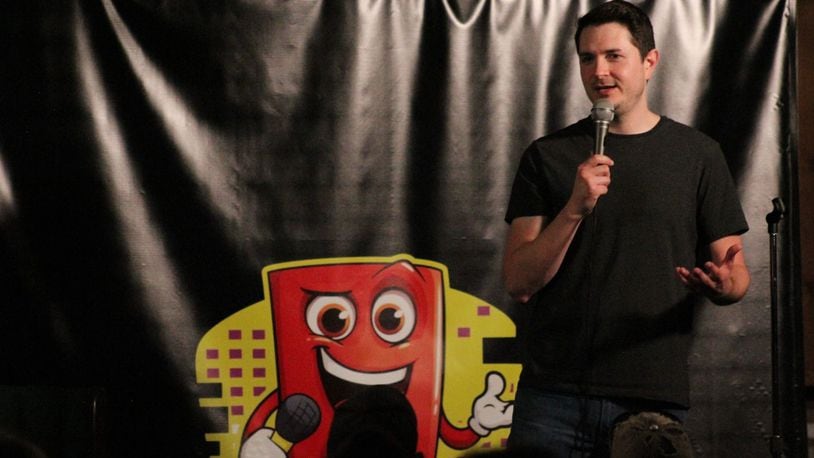 Kevin Ruppert, owner and founder of Bricky's Comedy Club, performs on stage. CONTRIBUTED