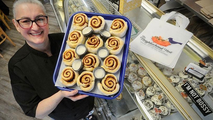 Neighborhood Nest founder Amber Tipton is celebrating her fifth anniversary in Fairborn. The bakery is very well known for its gluten-free cinnamon rolls. MARSHALL GORBY \STAFF