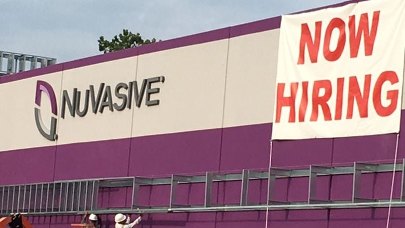 NuVasive Inc., which announced a move from Fairborn to West Carrollton in late 2015 as part of a $45 million expansion, is looking to hire for at least 30 positions for area operations. NICK BLIZZARD/STAFF WRITER