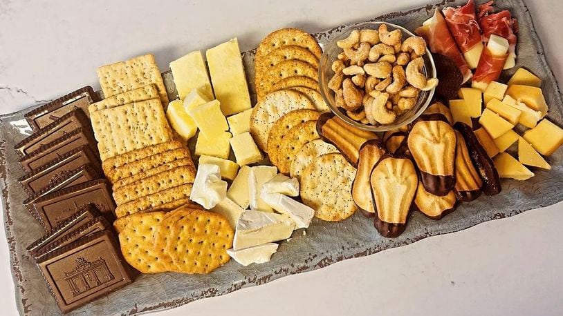 A cheese plate created completely with cheese, cookies, nuts and crackers from a local ALDI store. MANDY GAMBRELL/STAFF