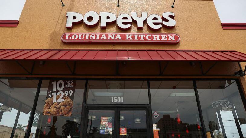 A Popeyes employee in Fort Worth, Texas, said she was hit over the head with a tray by an angry customer.