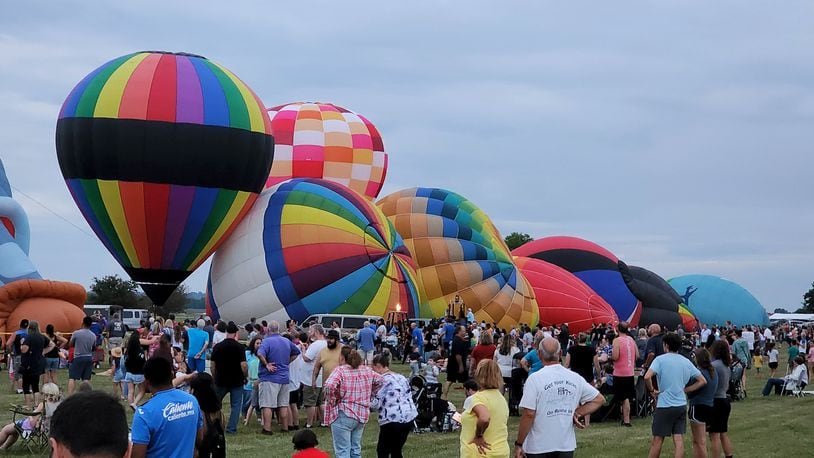 File photo: Opening day of The Ohio Challenge hot air balloon festival featured s balloon glow, fireworks and skydivers from Team Fastrax, craft vendors, food and more Friday night, July 15, 2022 at Smith Park in Middletown. NICK GRAHAM/STAFF