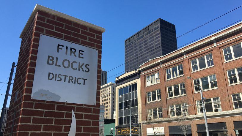 The Fire Blocks District, centered around the 100 block of East Third Street, received nearly $4.5 million in state historic tax credits, which could be at risk if the developer doesn’t show the state the project has financing. CORNELIUS FROLIK / STAFF