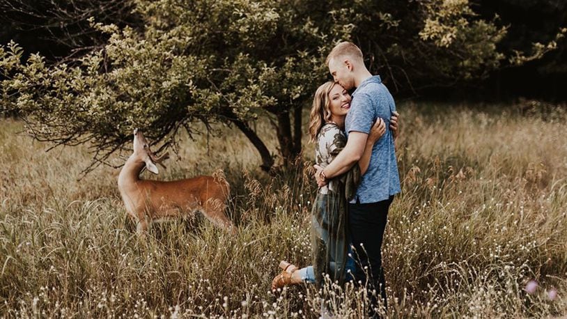 A deer crashed an engagement photoshoot in Michigan