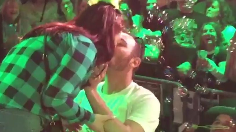 Jim Bucher captured the moment a couple was engaged on Dublin Pub's St. Patrick's Day stage on Thursday, March, 18 2016.