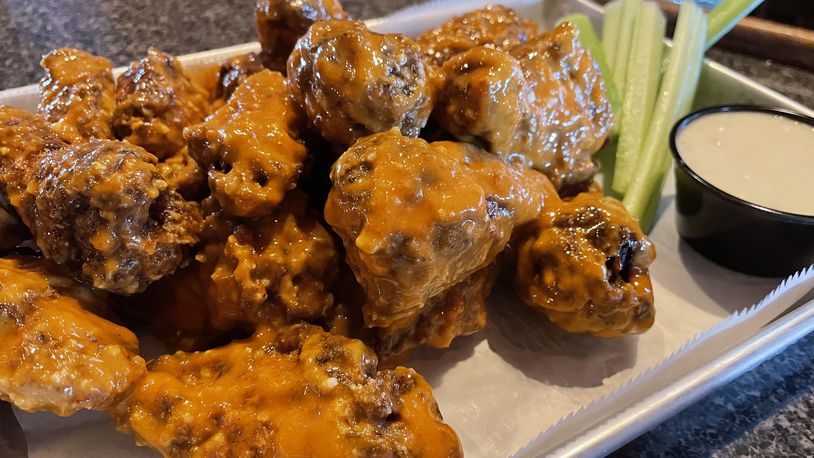 Archer’s Tavern is located at 9496 Dayton-Lebanon Pike in Centerville and 2030 E. Dorothy Lane in Kettering. Pictured is their Archer's Style wings (NATALIE JONES/STAFF)