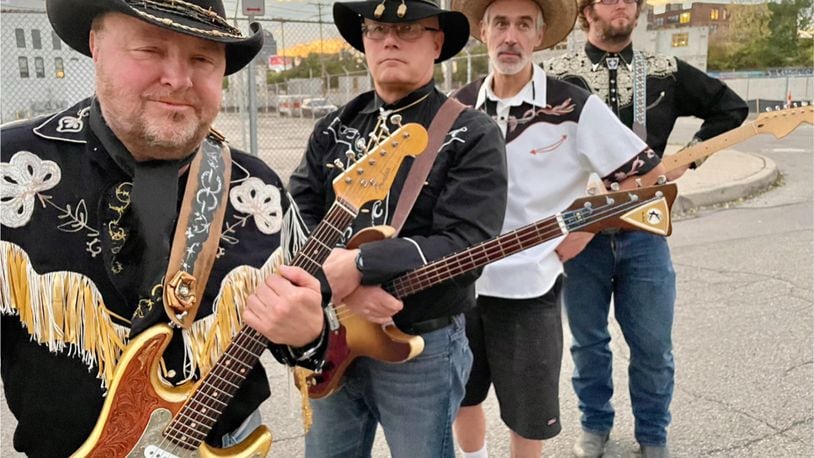 Local honky-tonk country act Golden Guy and His Bucking Bloviators, (left to right) Golden Guy, Col. Poppin, Lanky Luke and Plectrum, celebrate the new Atom Records release, “Personal Pain,” at Hidden Gem Music Club in Centerville on Friday, Oct. 20.