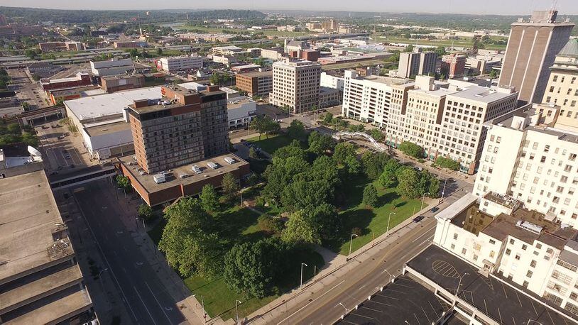 An aerial view of the land where supporters hope to build Levitt Pavilion Dayton. Plans call for a 2,564-square-foot performance pavilion on the 100 block of South Main Street on Dave Hall Plaza, as well as a 2,100-square-foot service building on the 100 block of South Jefferson Street. TY GREENLEES / STAFF